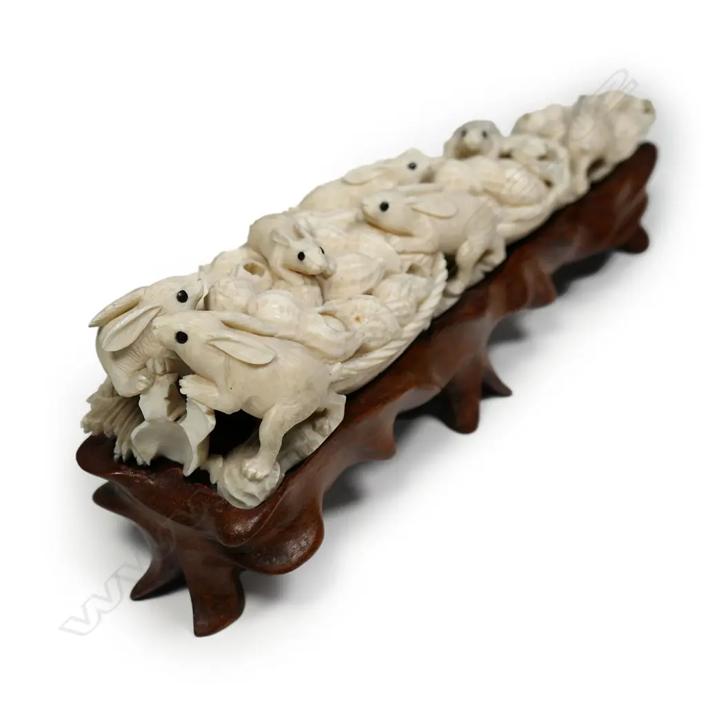 A characterful early mid 20thC Japanese carved ivory okimono of rabbits amongst peanuts, Image 1++
