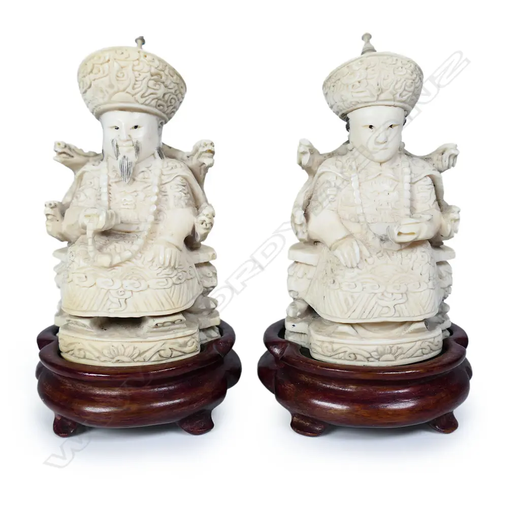 A pair of small Chinese carved ivory emperor and empress figures, Image 1++