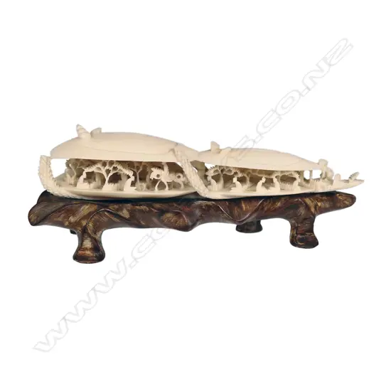 A carved ivory double dream shell,