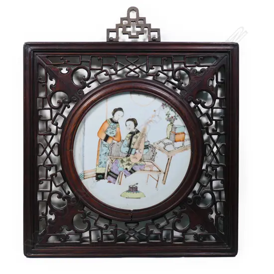 An old Chinese famille rose circular porcelain plaque,