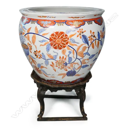 A large vintage Chinese fish bowl on stand,