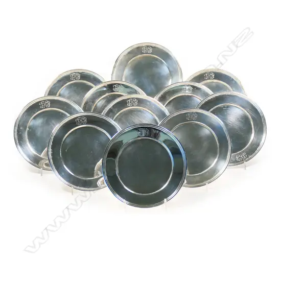 Eleven contemporary Cartier small silver trays,