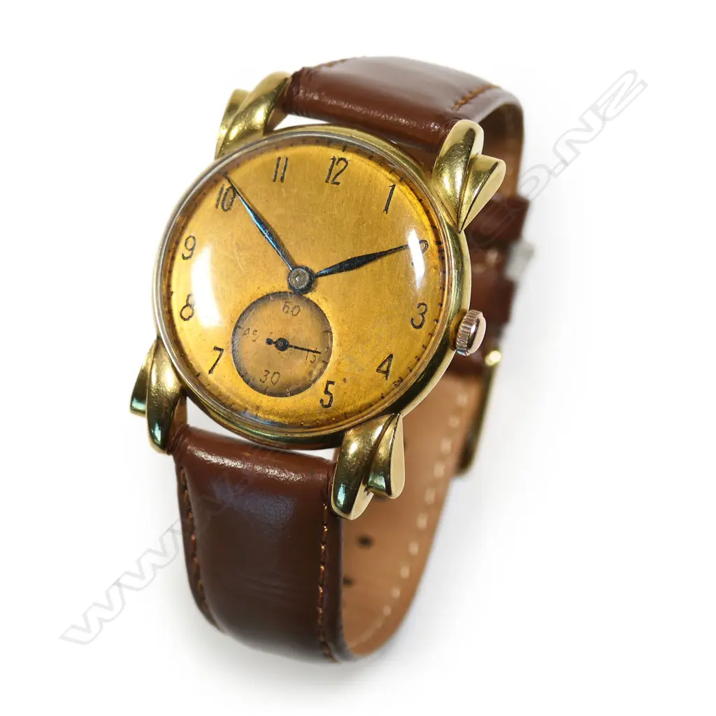 An IWC (International Watch Company) 1940's vintage gent's 18ct yellow gold wrist watch, Image 1++