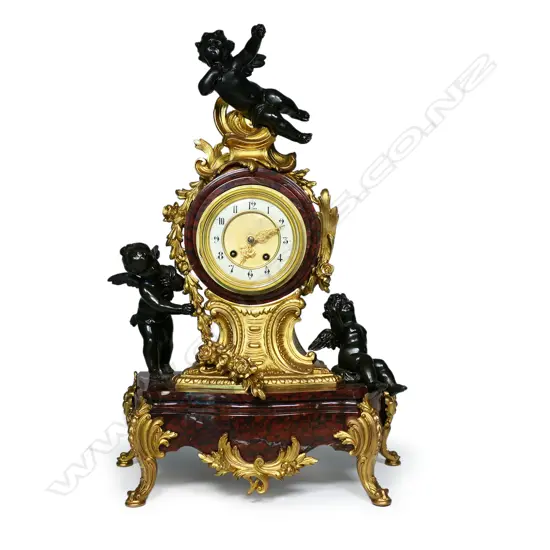 A 19thC French marble and ormolu mantel clock,