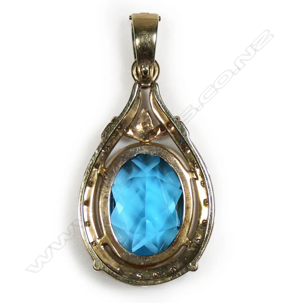 A 9ct gold blue topaz and diamond enhancer, Image 1++