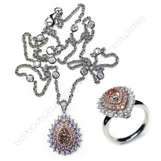 An 18ct white gold and pink diamond ring/pendant converting necklace,