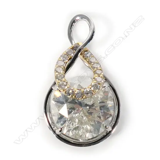 A 14ct white and yellow gold and diamond infinity style pendant,