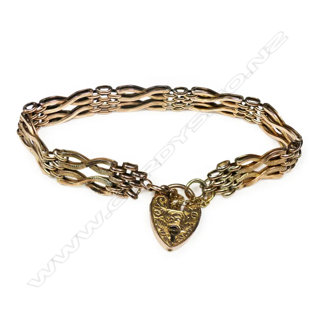 An early 20thC 9ct rose gold gate link bracelet, Image 1++