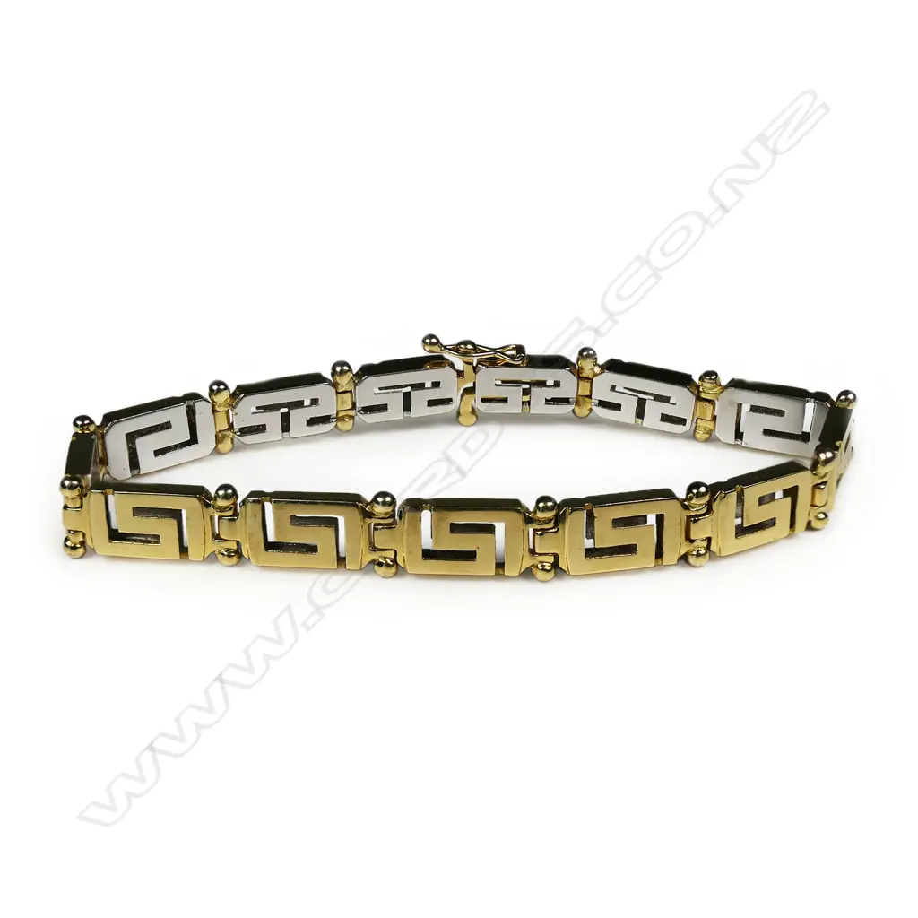 An 18ct yellow and white gold designer bracelet, Image 1++
