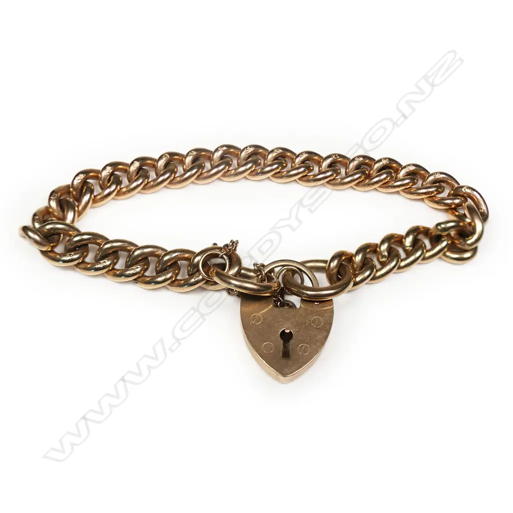 A good early 20thC 9ct rose gold curb link bracelet, Image 1++