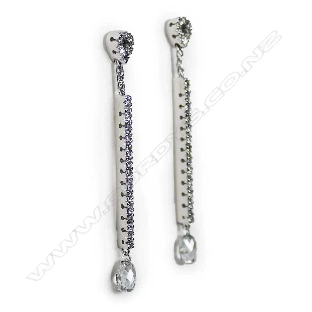 A pair of 18ct white gold and diamond earrings, Image 1++