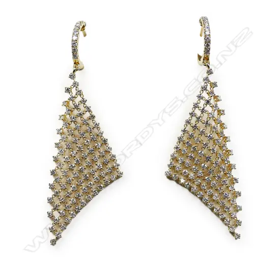 A pair of modern 18ct. white gold and multi-diamond set 'sail' earrings