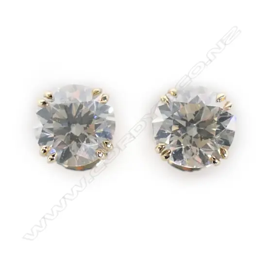 A pair of 14ct gold and diamond stud earrings,