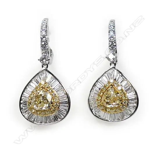 A pair of 18ct white gold diamond earrings,