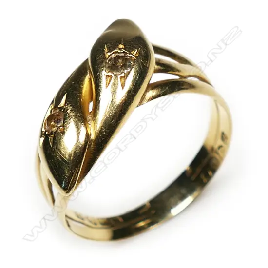 An early 20thC 18ct yellow gold double snake ring,