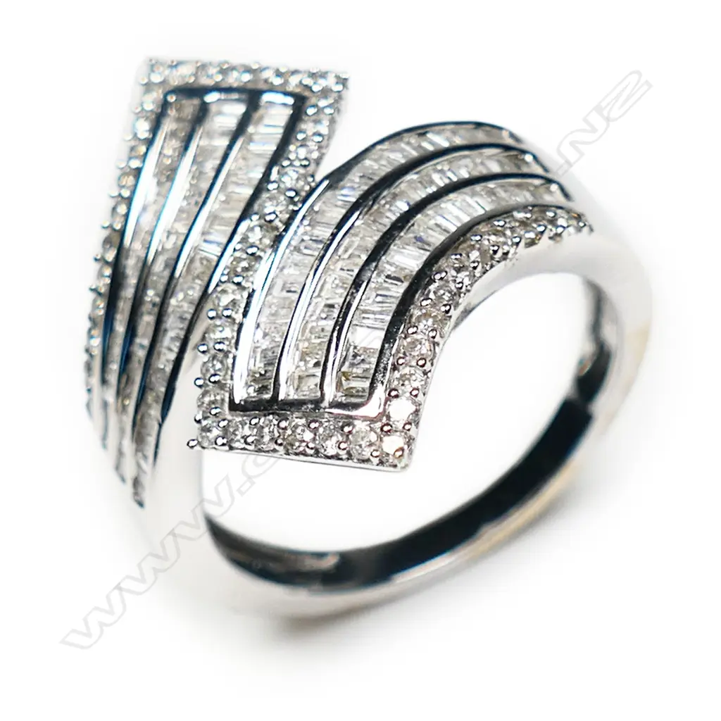 A 9ct white gold and multi diamond designer ring, Image 1++