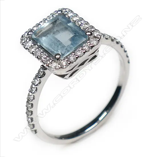A 14ct white gold aquamarine and diamond ring,