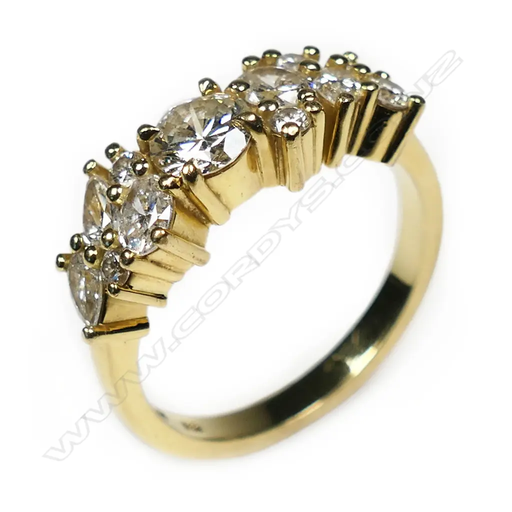 An 18ct gold and diamond dress ring, Image 1++