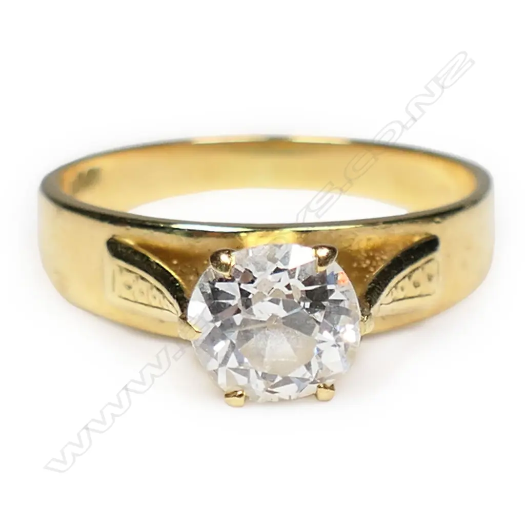 An estate 18ct gold and diamond solitaire ring, Image 1++