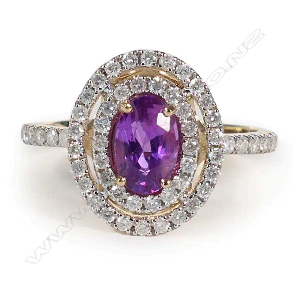 A 14ct gold pink sapphire and diamond double halo ring, Image 1++