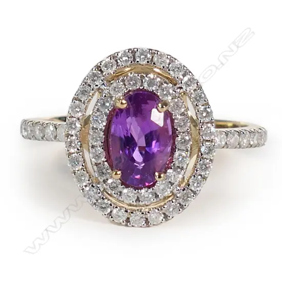 A 14ct gold pink sapphire and diamond double halo ring,