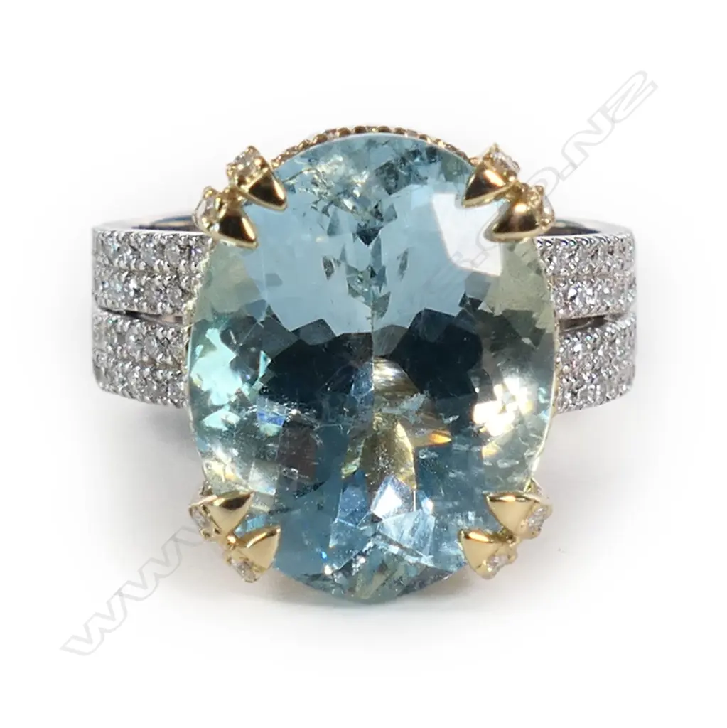 A 14ct white and yellow gold aquamarine and diamond dress ring, Image 1++