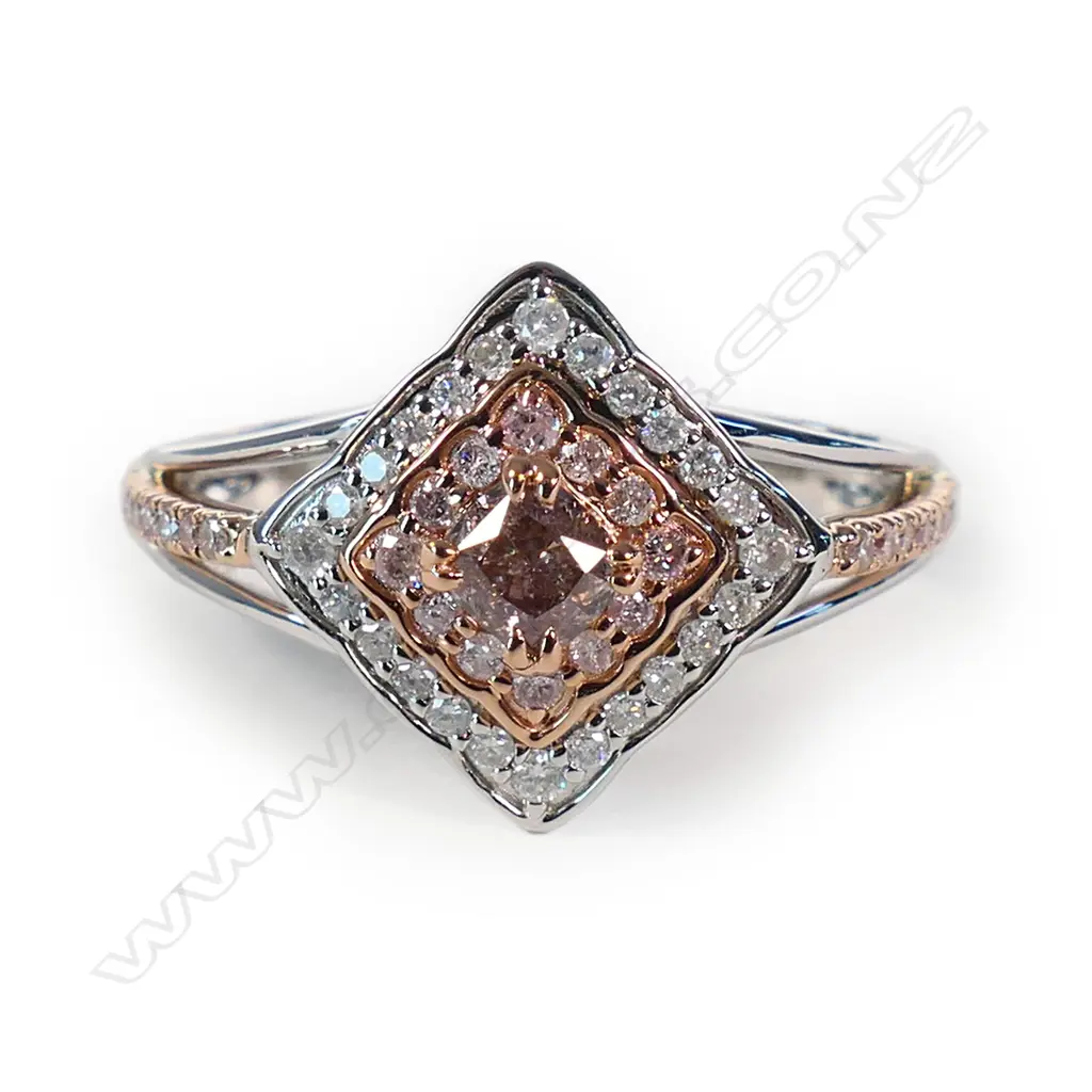 A 14ct white and rose gold pink diamond halo ring, Image 1++