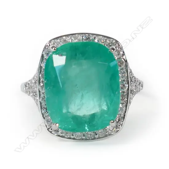 A 14ct white gold, Columbian emerald and diamond ring,