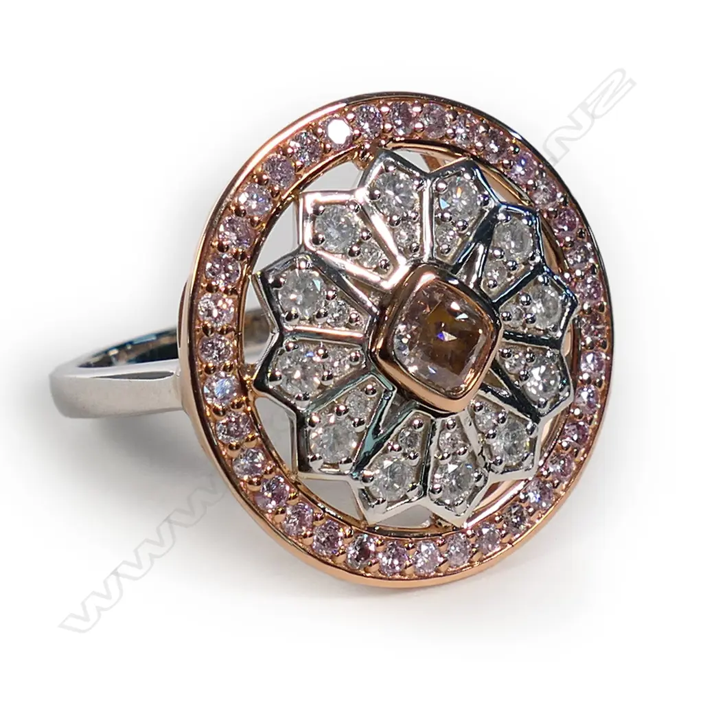 A 14ct white and rose gold pink diamond halo dress ring, Image 1++