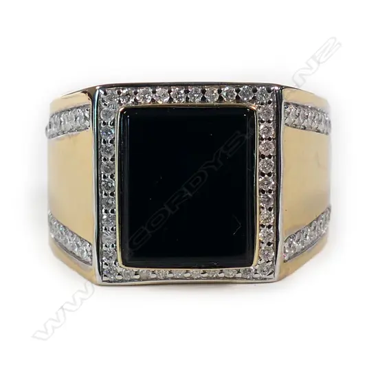 A 14ct gold black onyx and diamond gent's ring,