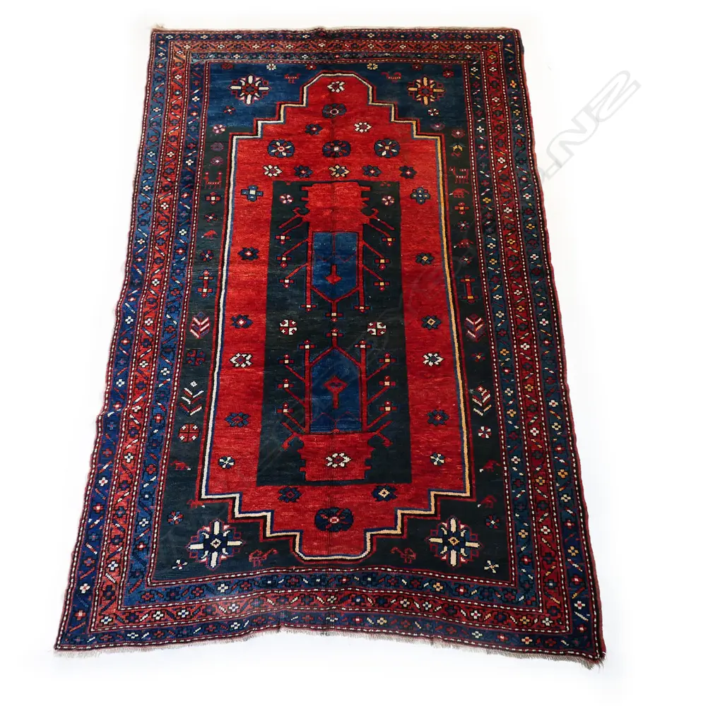 A hand-woven Kazak rug, Image 1++