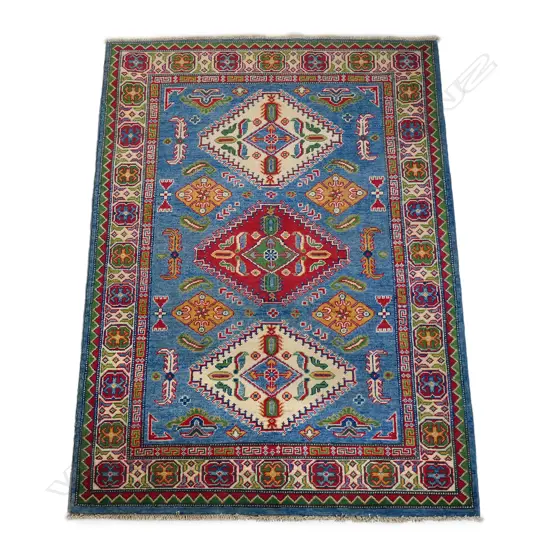 A hand knotted Kazak rug,
