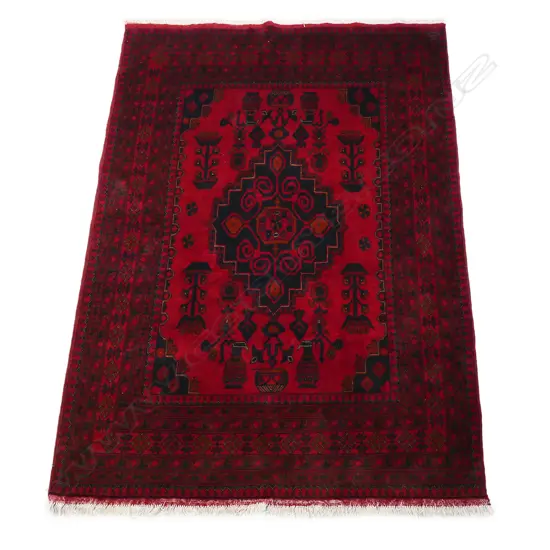 A hand knotted Andkhoy rug,