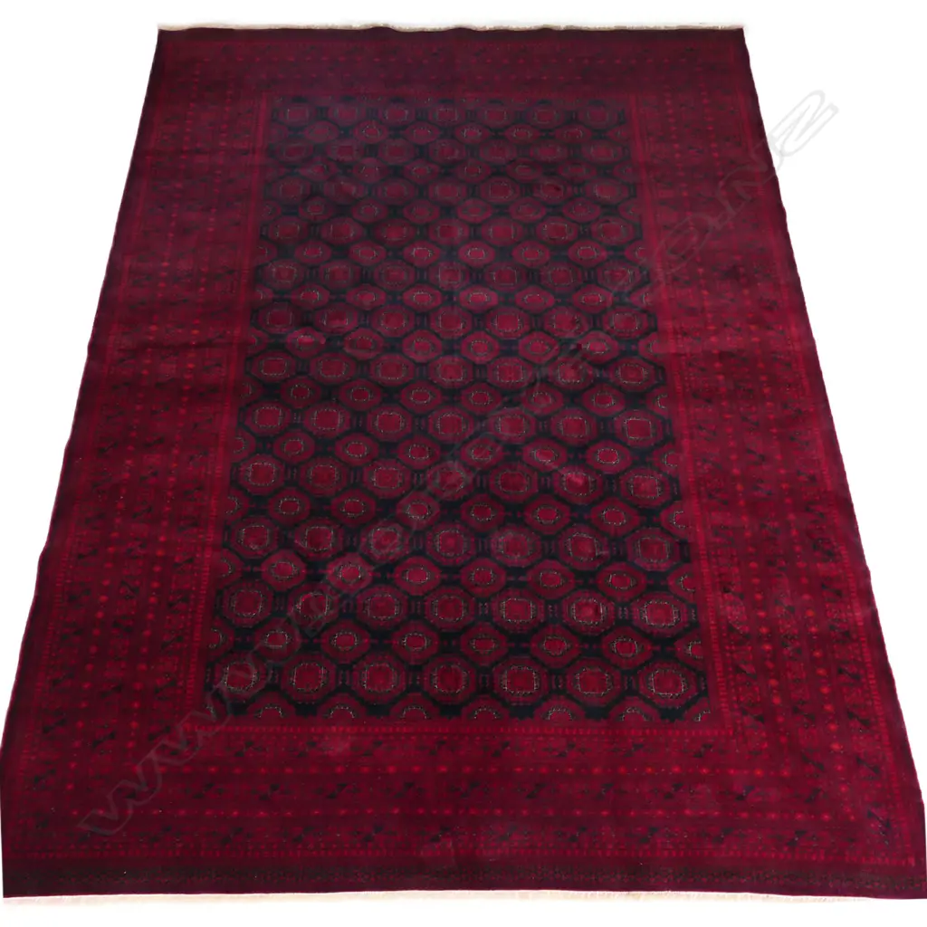 A fine hand knotted Bokhara rug, Image 1++