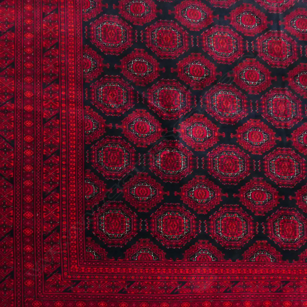 A fine hand knotted Bokhara rug, Image 1++