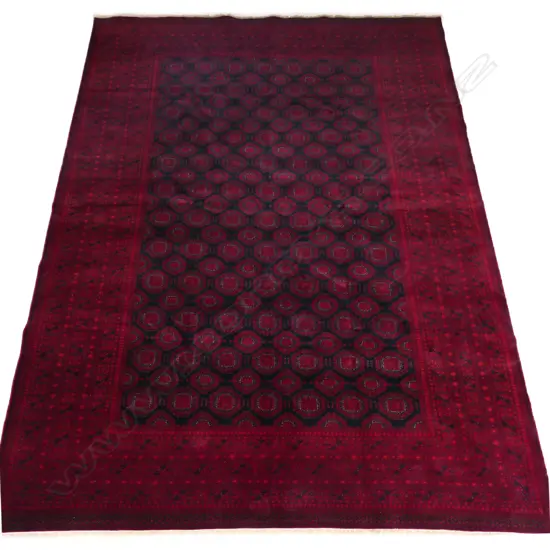 A fine hand knotted Bokhara rug,