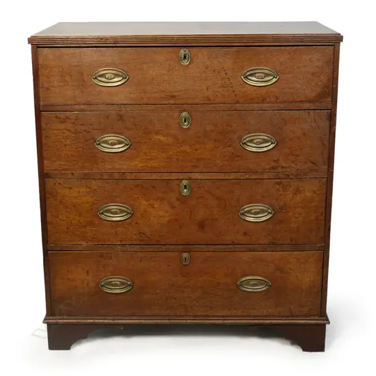A Georgian oak flat front four drawer chest,