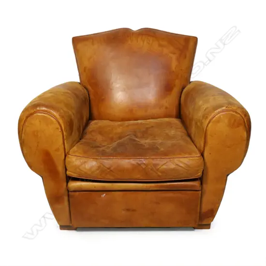 A vintage French leather club chair,