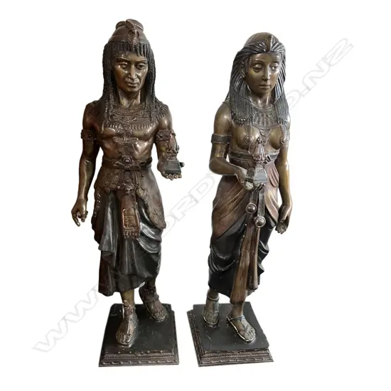 A pair of late 20thC cast bronze Egyptian tall standing figures,