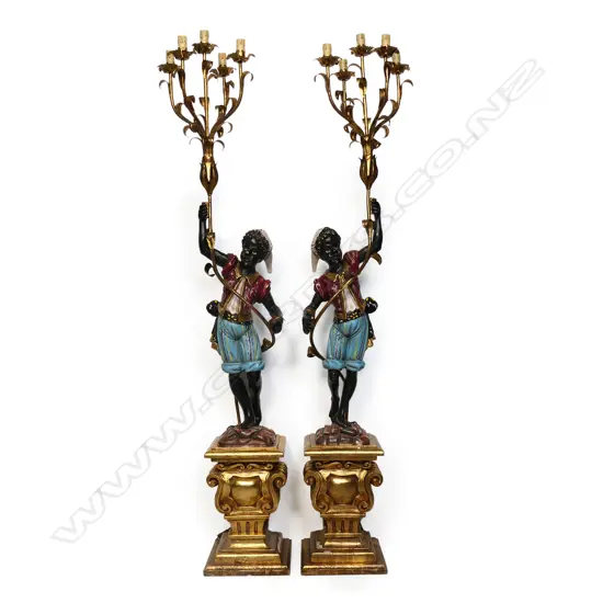 A pair of blackamoor floor lamps,