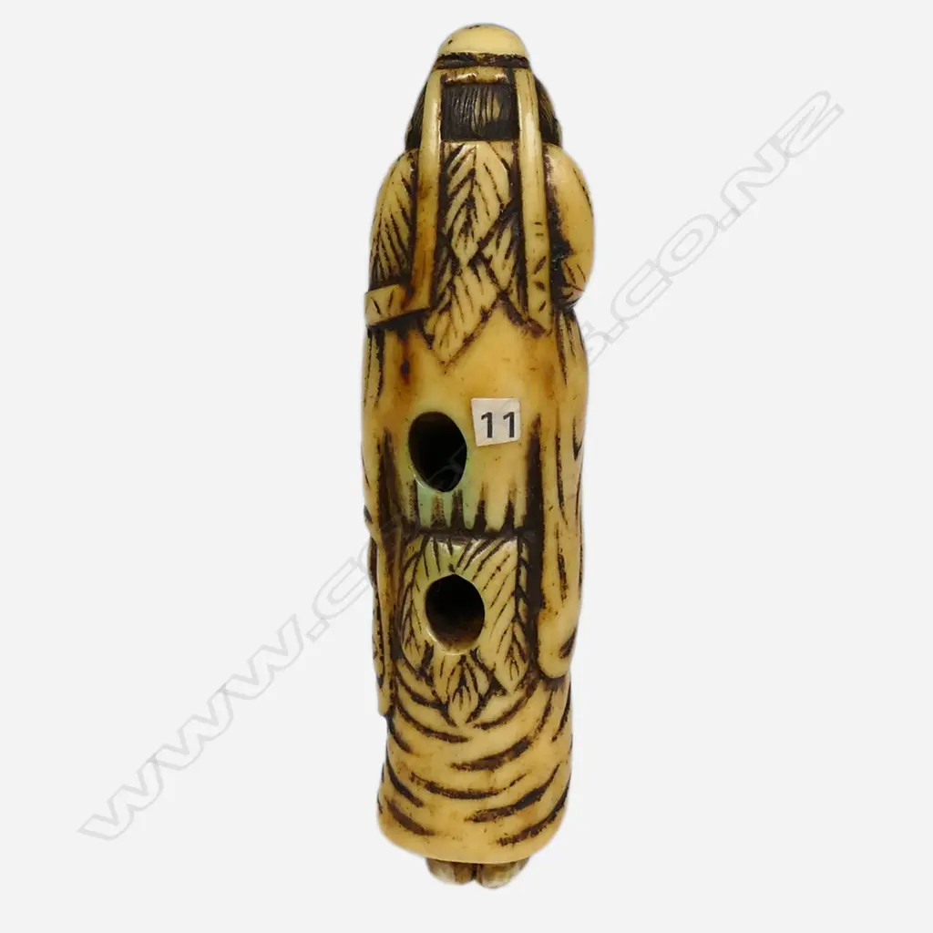 An18thC Edo period carved stag antler netsuke depicting a standing smiling foreigner, Image 1++
