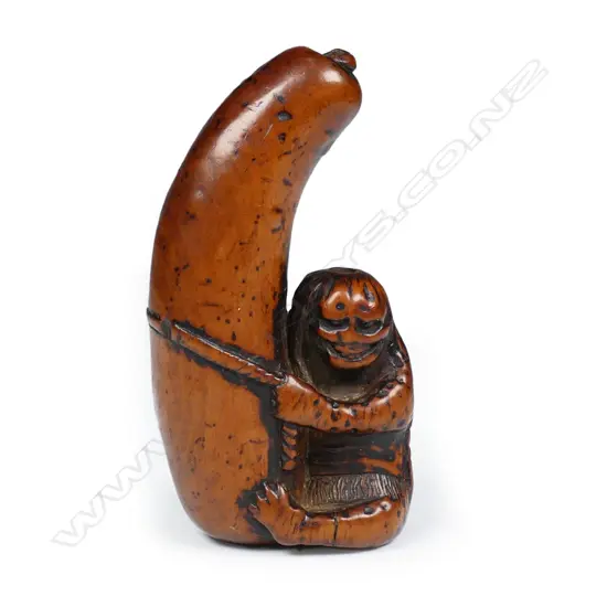 A good 18thC carved boxwood netsuke (Shunga),