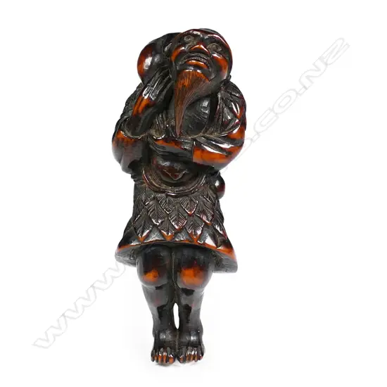 A well carved Japanese boxwood netsuke of Gama Sennin,