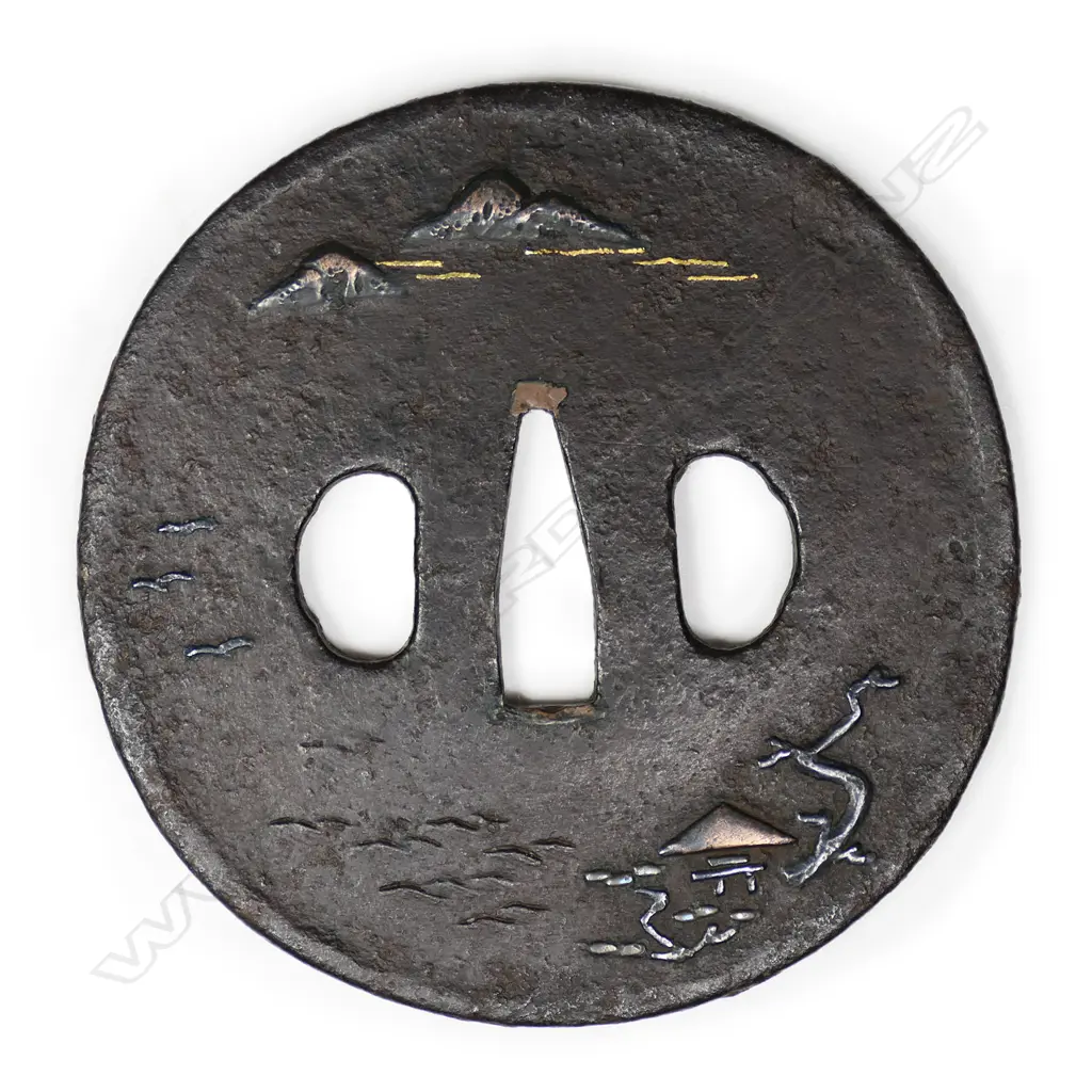 A large circular chocolate toned iron plate tsuba, Image 1++