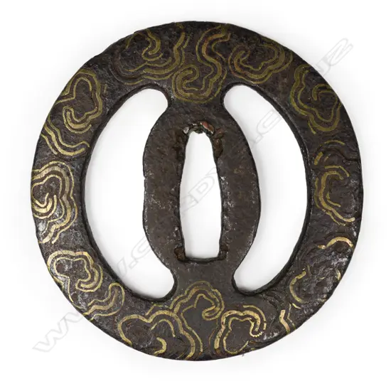 A circular Azuchi Momoyama Heianjo iron tsuba c.1580,