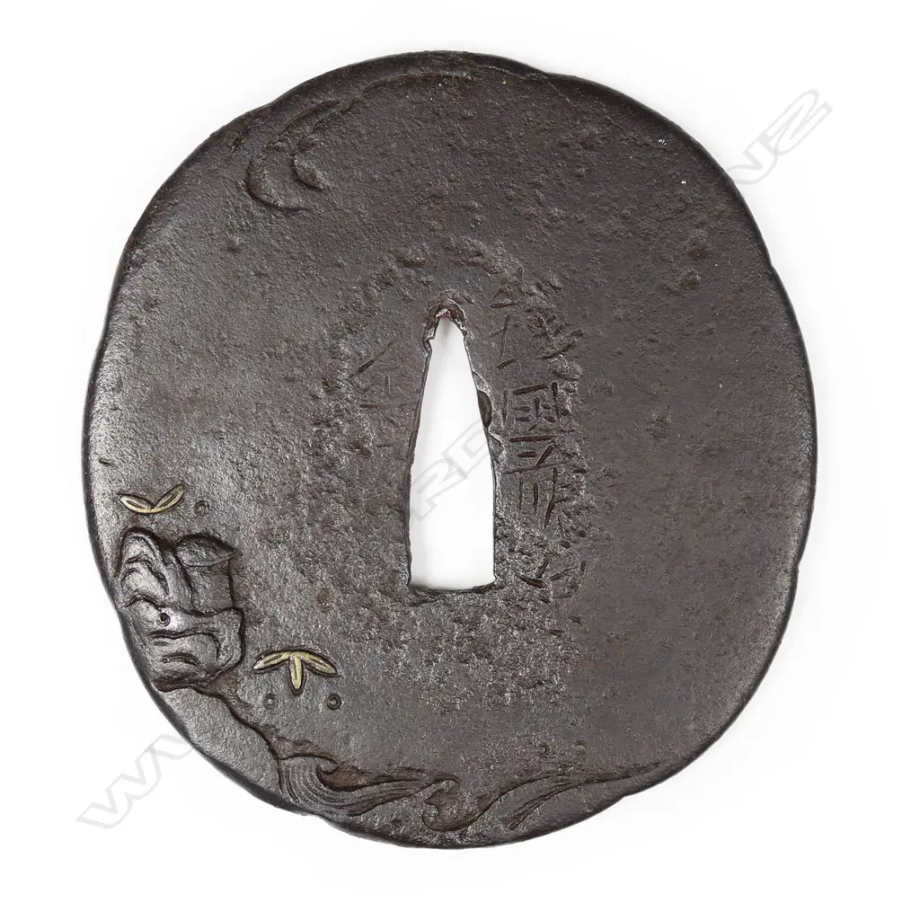A large early Edo period chocolate toned iron tsuba, c.1650, Image 1++