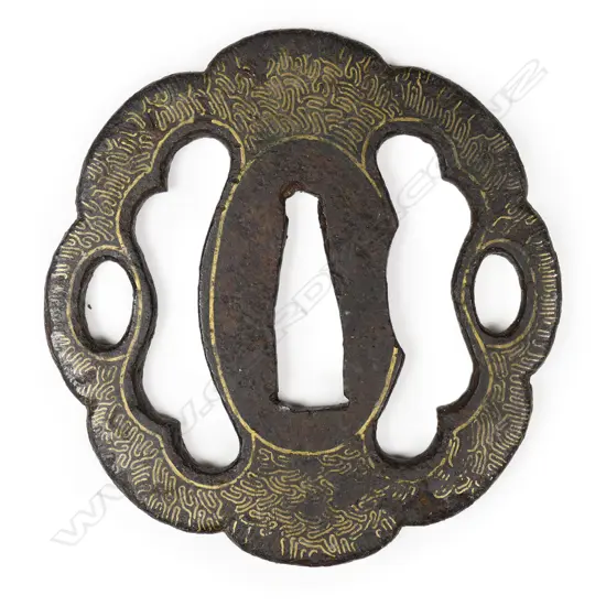 A 17thC Heianjo eight lobed iron tsuba,