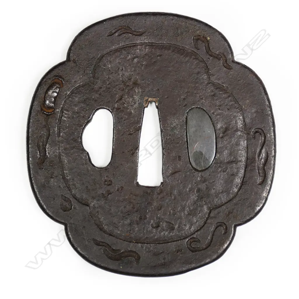 A large chocolate toned iron 17thC Mito school Edo Period tsuba, Image 1++