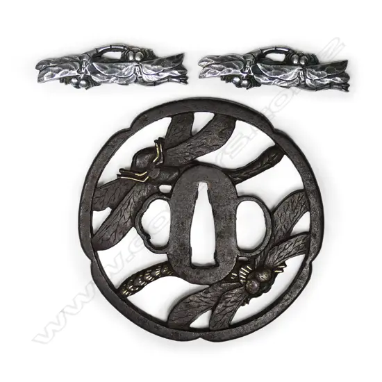 A large 18thC Edo period Sukashi iron tsuba and two good modern silver dragonfly menuki,