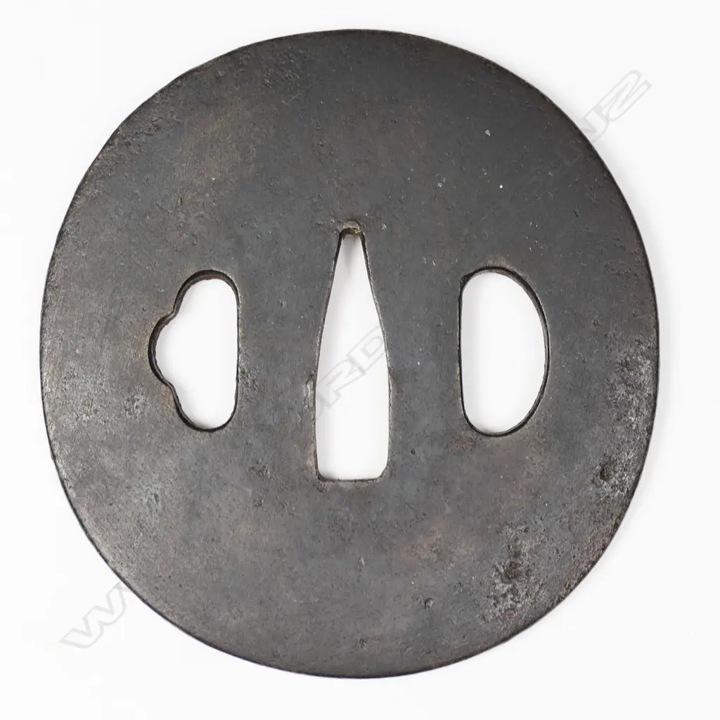 An Edo period oval chocolate toned iron tsuba c.1800, Image 1++